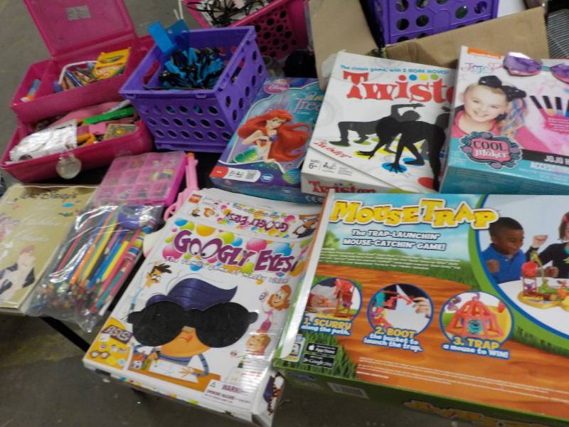 lot 9 image: Toys and Games in a covered tote...
