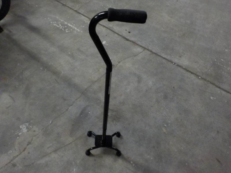 lot 29 image: 4 Footed Cane...