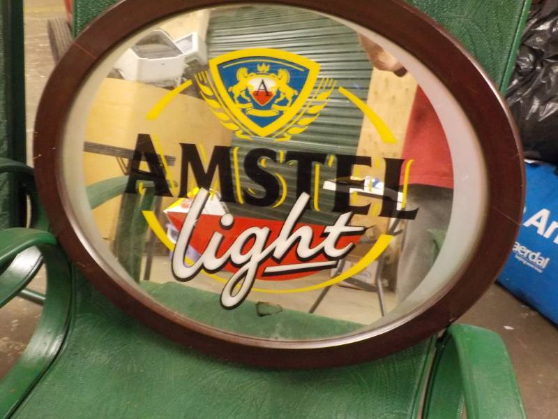 lot 32 image: Amstel Light Mirror Sign 23 x 19...