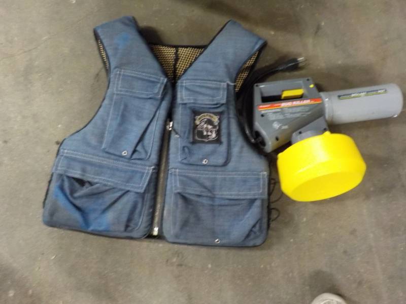 lot 61 image: Life Vest and bug killer...