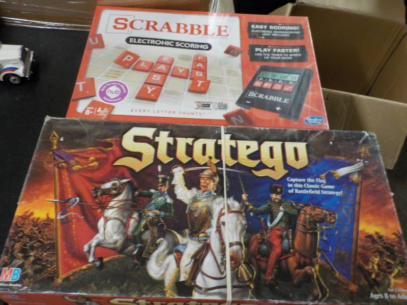 lot 123 image: Scrabble and Stratego Games...