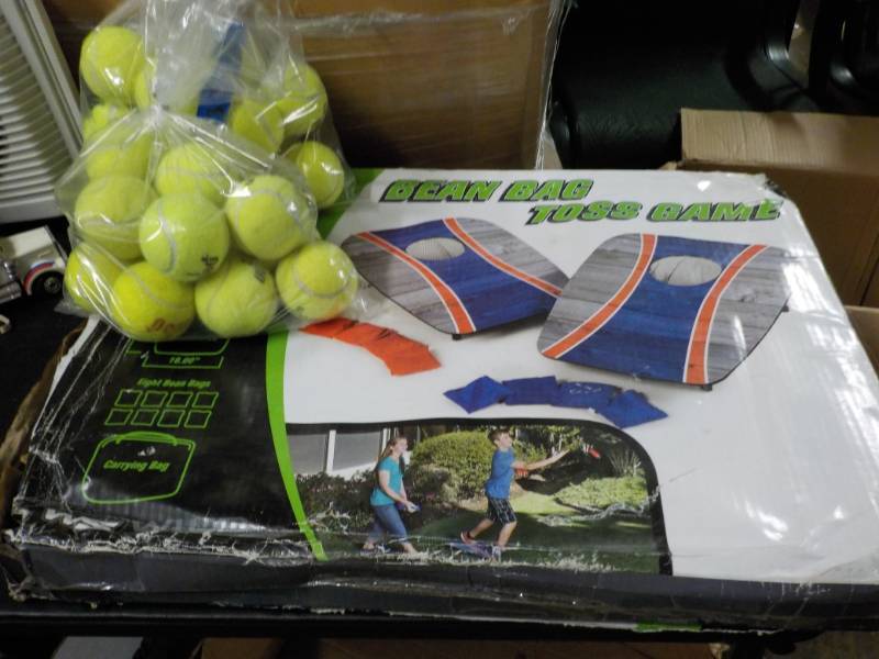 lot 128 image: Bean Bag Toss Game and 2 bags of Te...