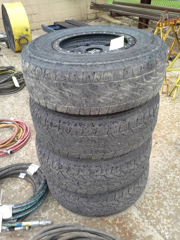 lot 238 image: Lot of (4) Bridgestone P26575R16 Tires with KMC XD Series Bead Lock 6-Lug  Wheels, Bead Lug Socket