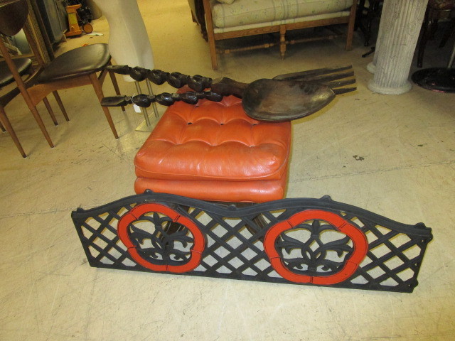 lot 137 image: CAST IRON WALL DECOR, FORK AND SPOON DECOR AND AN OTTOMAN
