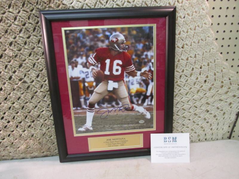 lot 5 image: Autographed Framed Joe Montana Pict...