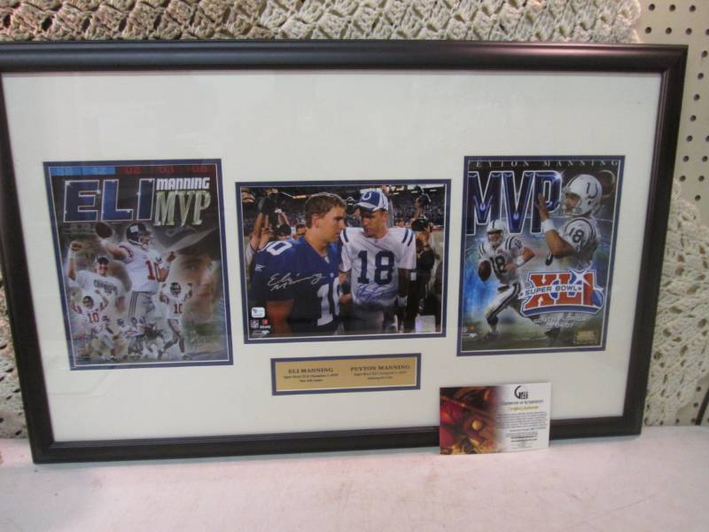 lot 8 image: Autographed Framed Eli Manning & Pe...