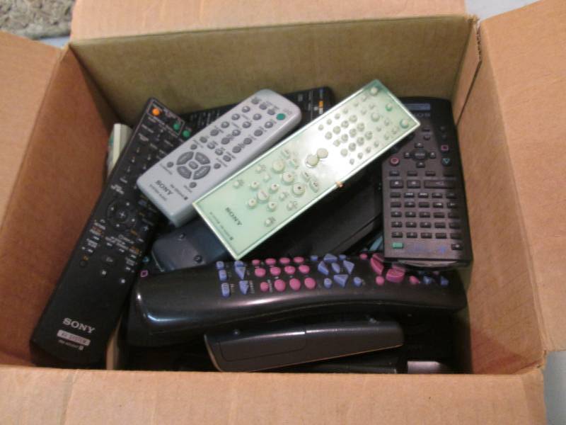 lot 28 image: Box of 22 Assorted Sony Remote Cont...