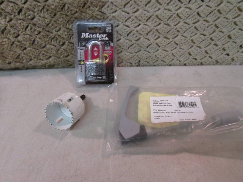 lot 39 image: New Master Lock Drill Hole Saw Etc ...