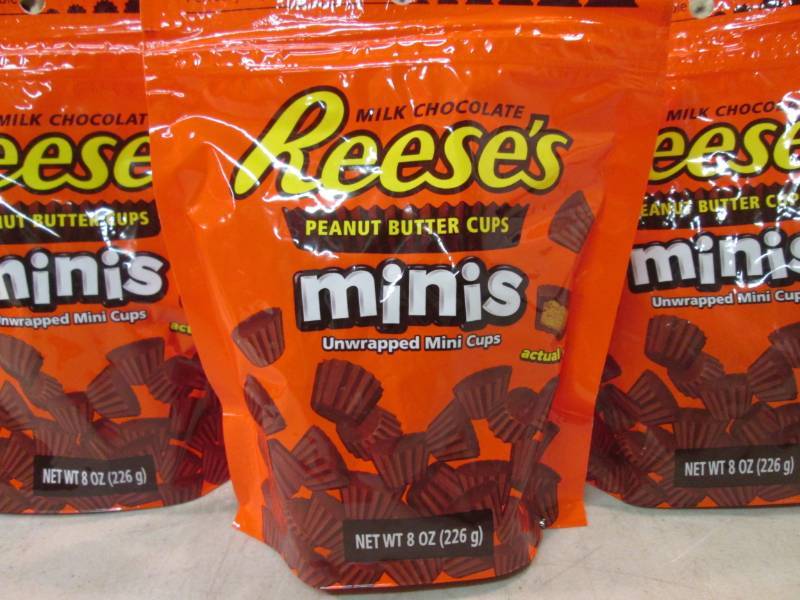 lot 48 image: 3 Bags of Reeses Minis Peanut Butte...