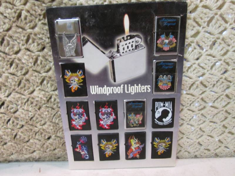 lot 107 image: Lot of 12 Flip Top Windproof Lighte...
