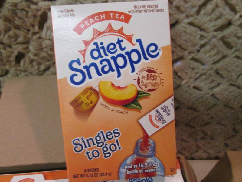 lot 199 image: 2 Cases of Diet Snapple Peach Tea S...