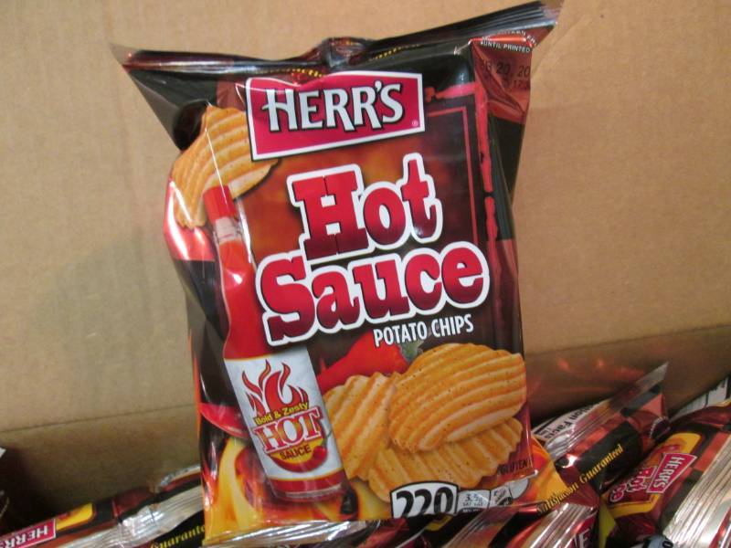 lot 262 image: Case of 30 Bags of Herrs Hot Sauce...