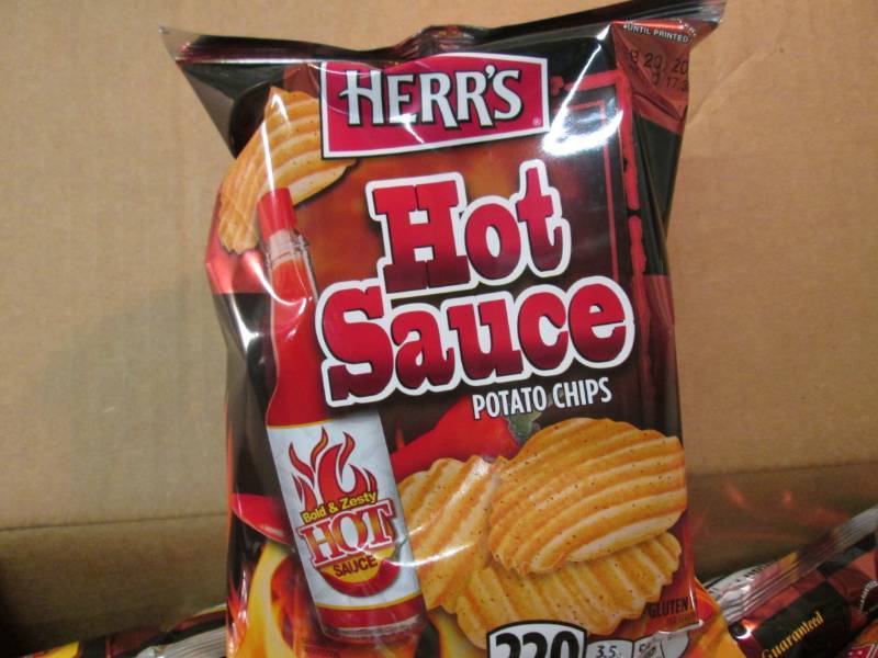 lot 264 image: Case of 30 Bags of Herrs Hot Sauce...