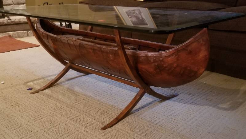 lot 16 image: Canoe with Paddles Glass Top Coffee Table