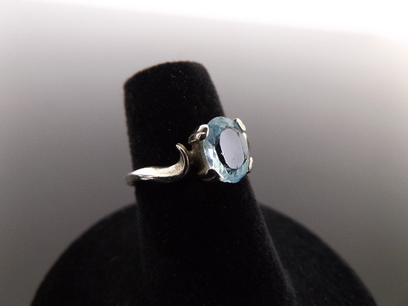 lot 36 image: .925 Sterling Silver Oval Cut Topaz Ring Size 5.5