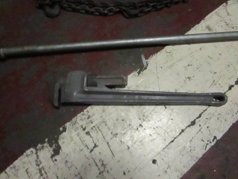 lot 77 image: Conduit Bender, Alum Pipe Wrench, Log Chain