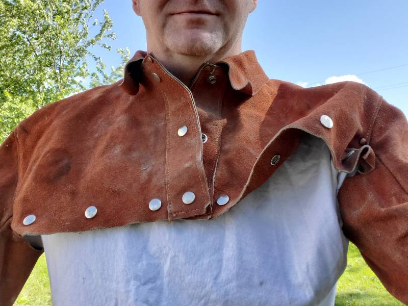 lot 24 image: Leather welders top bib with arms
