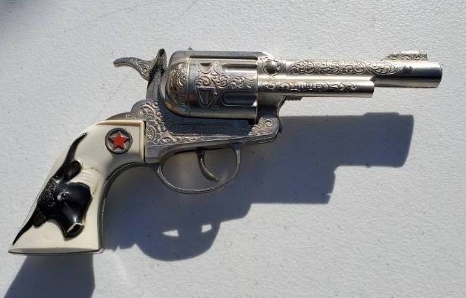 lot 29 image: Hubley Texan Jr. Toy Cap Gun