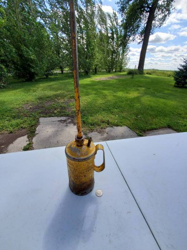 lot 66 image: Vintage Golden Rod Oil Can