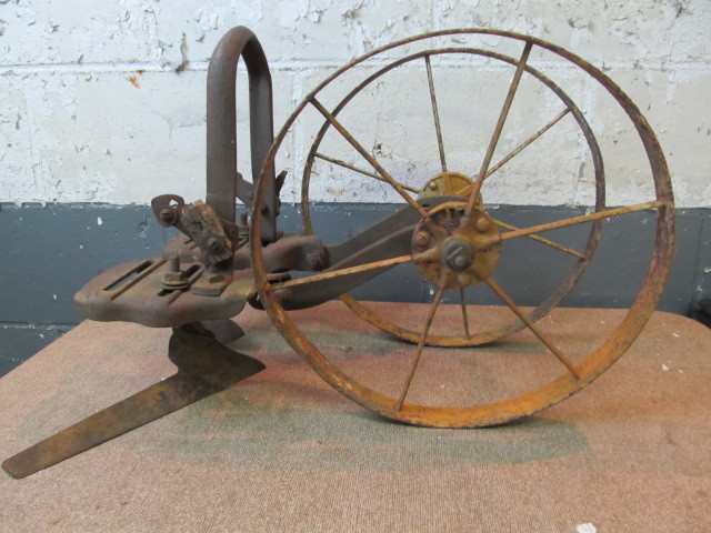 lot 92 image: Antique Cast Iron PLANET JR. Farm Implement