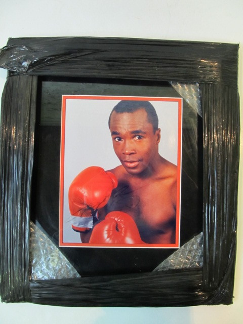 lot 93 image: SUGAR RAY LEONARD Framed Autographed Photo