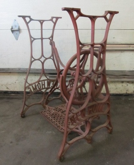 lot 65 image: Nice Antique Cast Iron NEW HOME Sewing Machine Table Base
