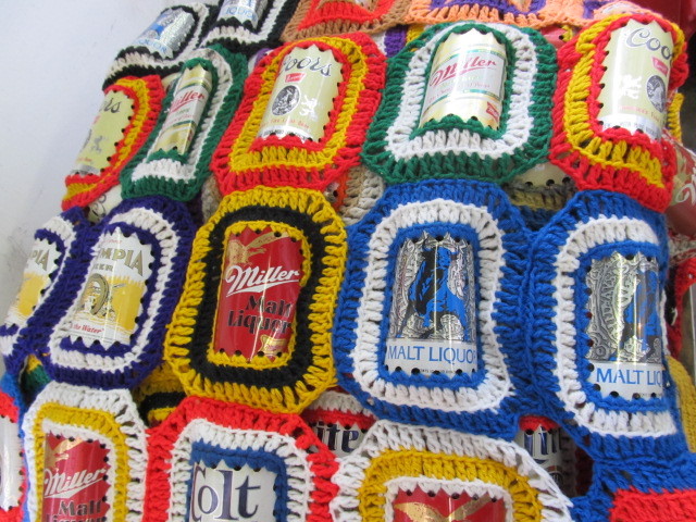 lot 109 image: Large Lot of Crocheted Beer Can Wall Hangings