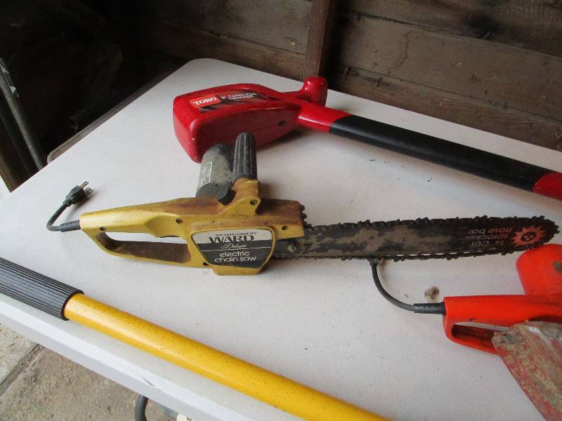 lot 79 image: (2) Electric Chainsaws, (2) Cordless Trimmer, Electric Pole Saw