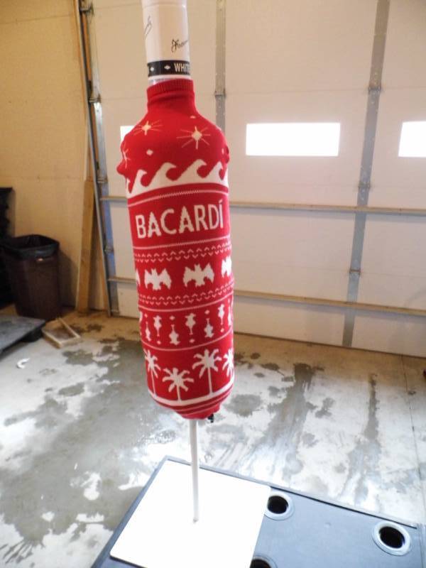 lot 67 image: Large Plastic Bacardi Bottle on Stand