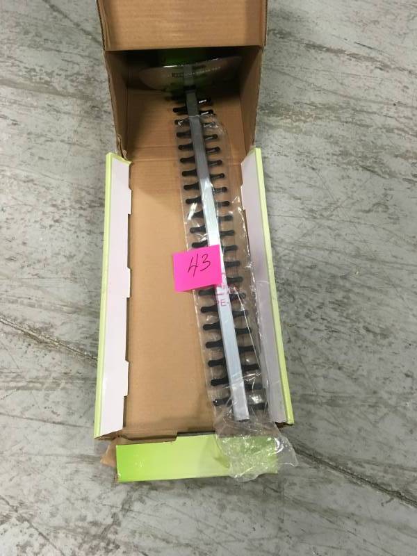 lot 43 image: Greenworks 22 in. 4 Amp Electric Hedge Trimmer in very good condition
