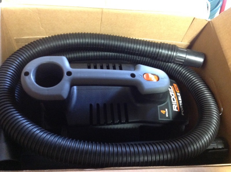 lot 104 image: Ridgid 4 Gal. 5.0-Peak HP Portable WetDry Vacuum in very good condition