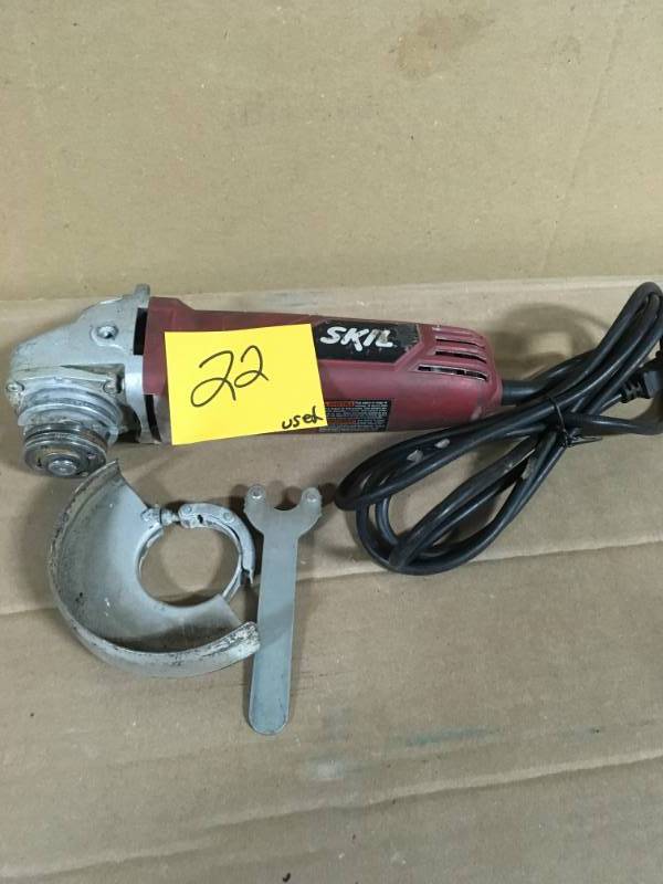 lot 22 image: Milwaukee 7 Amp Corded 4-12 in. Small Angle Grinder with Sliding Lock-On Switch USED in good condition