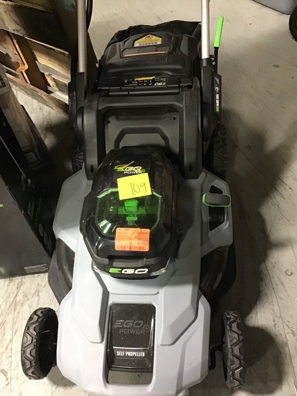 lot 109 image: Ego Self propel lawnmower and 15 in Cordless String Trimmer 56 volt 1 battery and charger included in very good condition