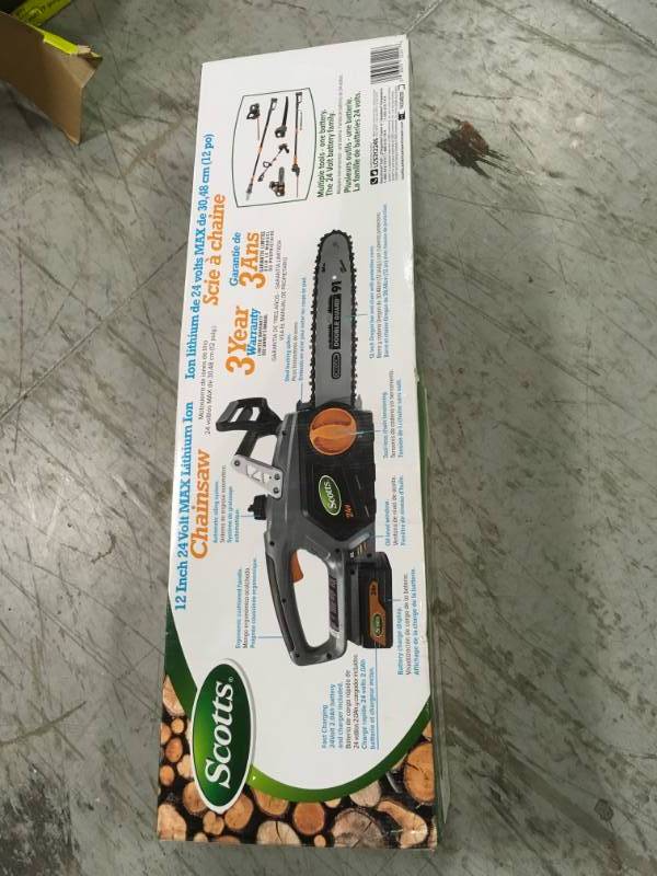 lot 35 image: Scotts 12 in. 24-Volt Electric Cordless Chainsaw in very good condition