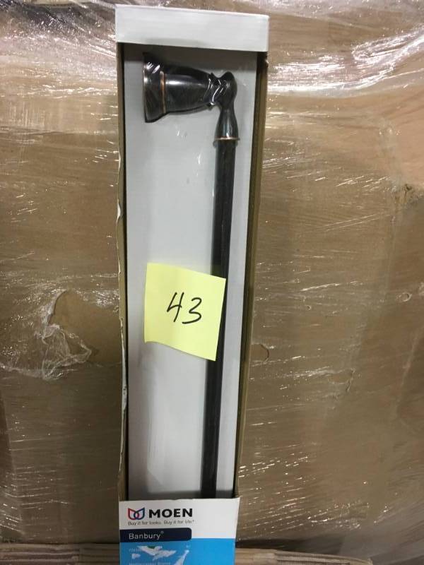 lot 43 image: MOEN Banbury 24 in. Towel Bar in Mediterranean Bronze in very good condition
