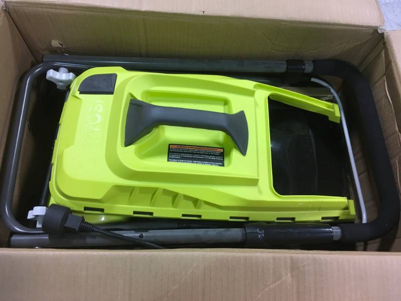 lot 29 image: RYOBI 13 in electric lawnmower in good condition