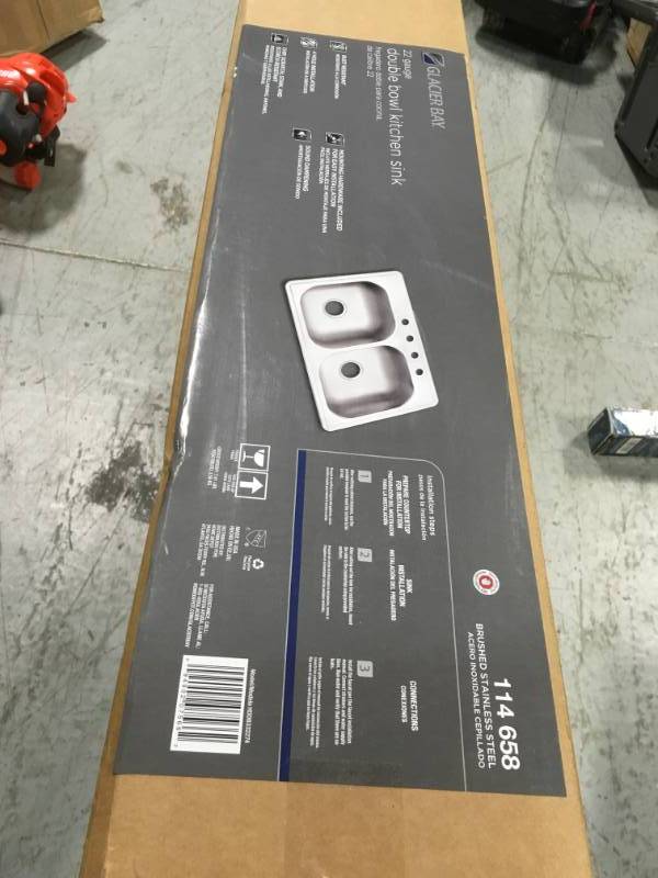 lot 34 image: Glacier Bay Drop-In Stainless Steel 33 in. 4-Hole Double Bowl Kitchen Sink not used