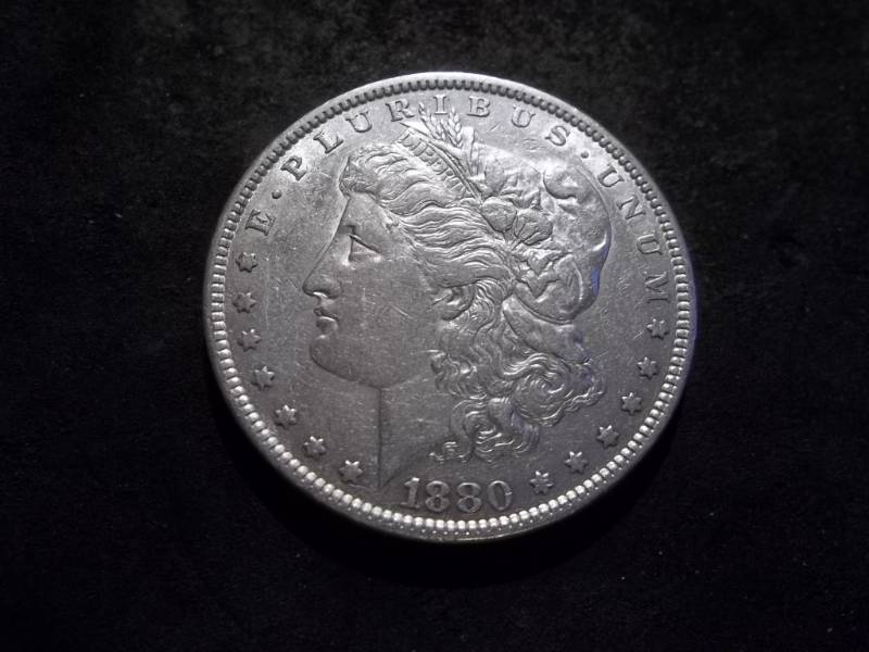 lot 1 image: 1880 Morgan Silver Dollar