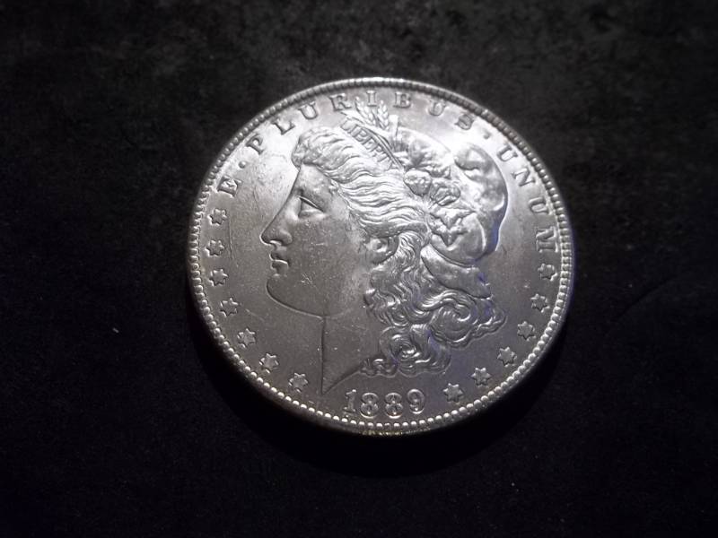 lot 7 image: 1889 Morgan Silver Dollar