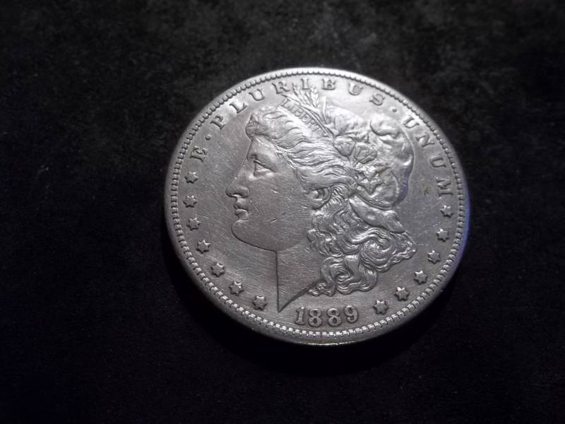 lot 8 image: 1889 S Morgan Silver Dollar