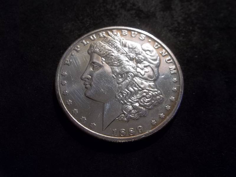 lot 9 image: 1889 CC Morgan Silver Dollar COPY