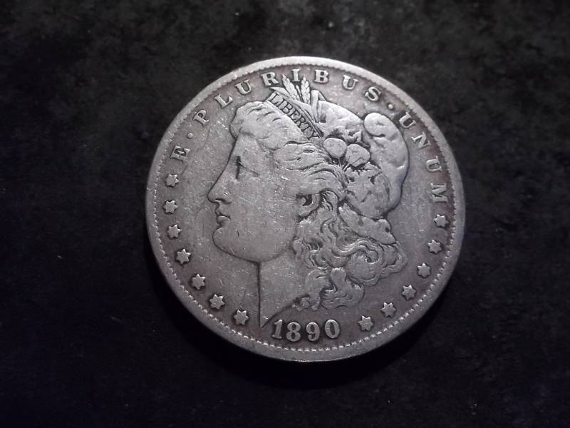 lot 10 image: 1890 O Morgan Silver Dollar
