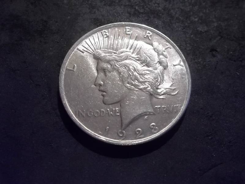 lot 21 image: 1923 Peace Silver Dollar