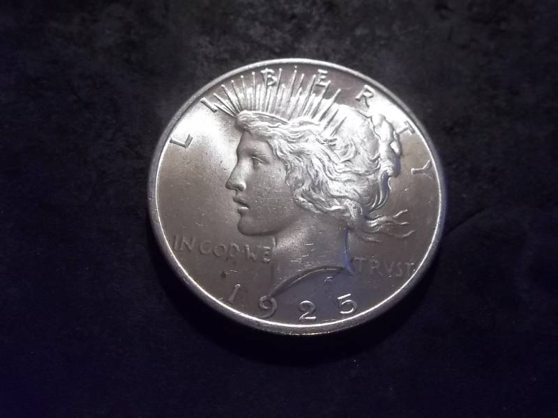 lot 22 image: 1925 Peace Silver Dollar
