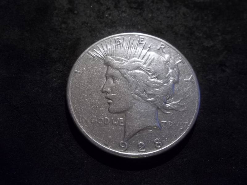 lot 26 image: 1928 S Silver Peace Dollar