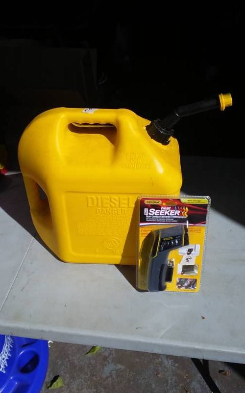 lot 7 image: Diesel Can & (New) Infrared Thermometer