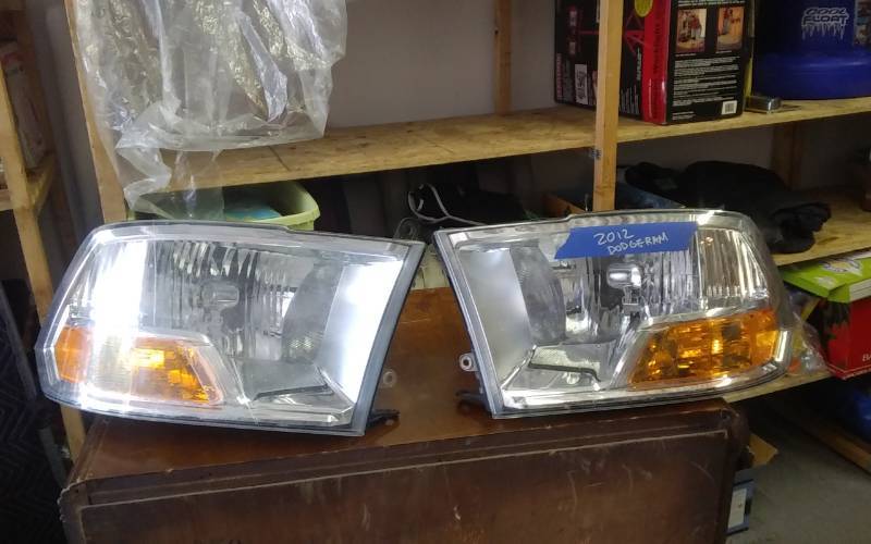 lot 28 image: Pair Of 2012 Dodge Ram Headlights