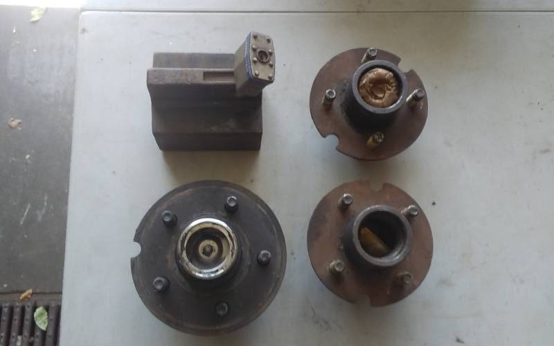 lot 36 image: 3-Trailer Hubs, 1-Trailer Tongue Lock