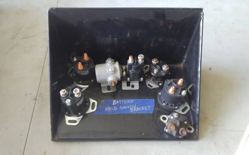 lot 40 image: Battery Hold Down Bracket, 7-Assorted Starter Celenoids