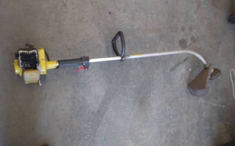 lot 73 image: John Deere 200G Weed Whip